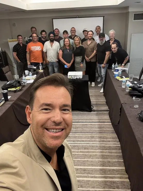 Brady Sticker with the Titans mastermind group in the boardroom