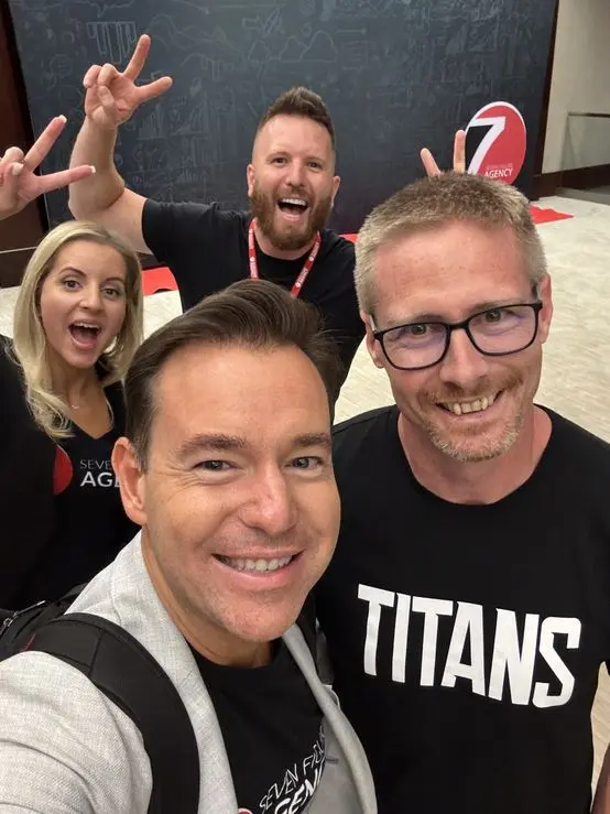 Titans shirts on with the Seven Figure Agency crew