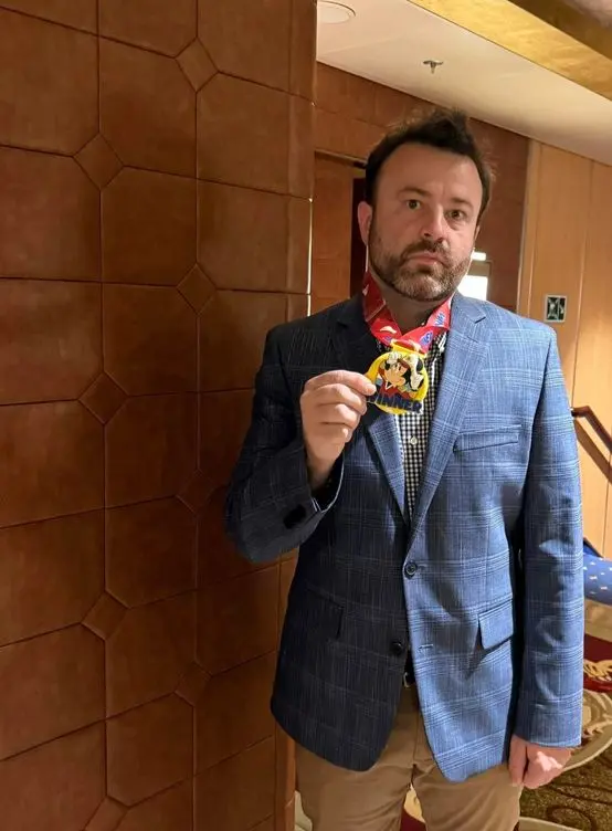 Winner medal in hand at a Seven Figure Agency event