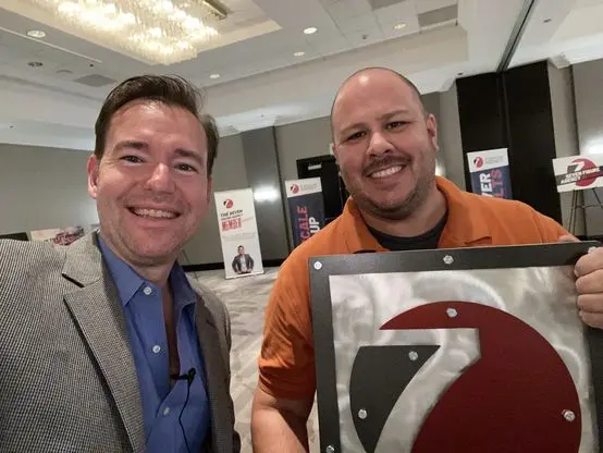 With Josh Nelson and the seven figure agency plaque