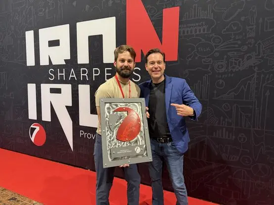 Luke with his Seven Figure Agency plaque alongside Josh Nelson