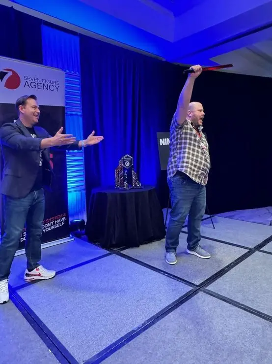 Sword up after taking the Mastermind Champions trophy