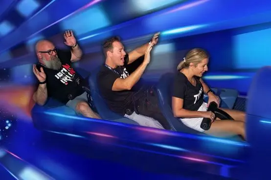 Hands up on the ride during a Titans mastermind trip