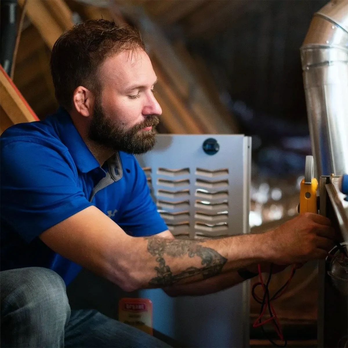 Acadiana technician servicing furnace