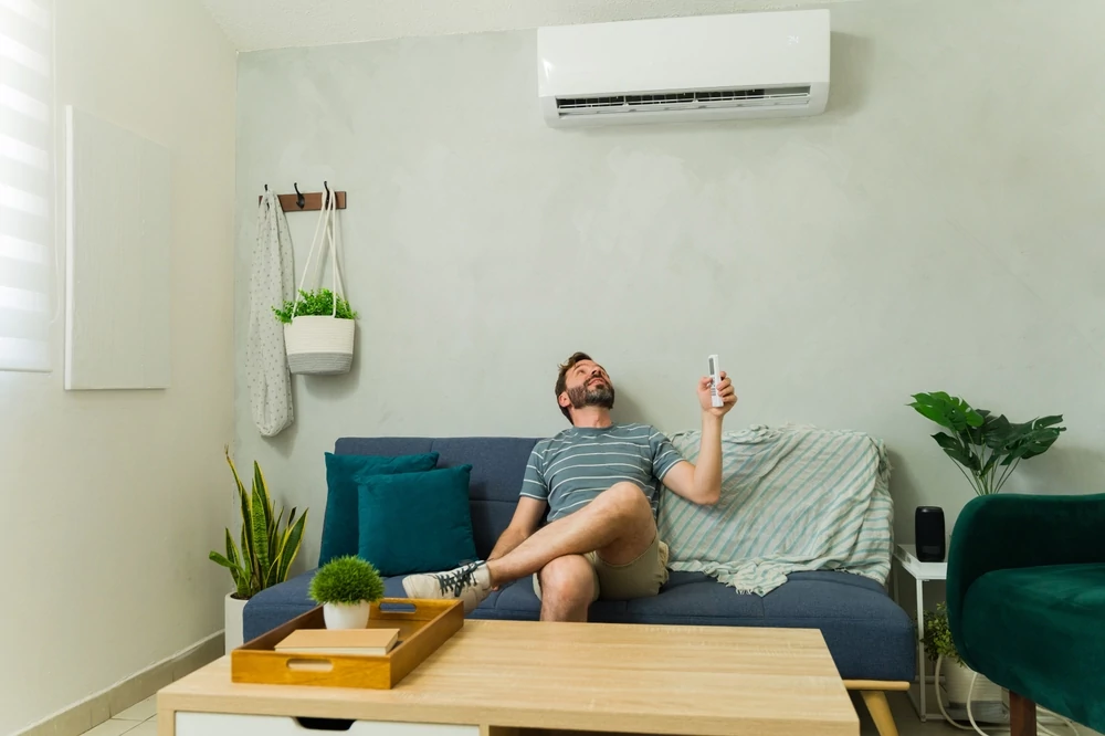 Person using mini split unit