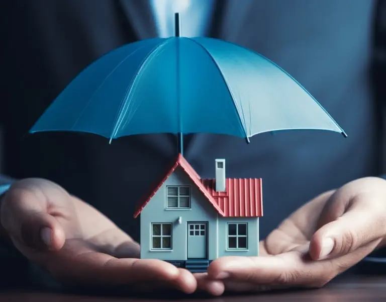 Mortgage Protection Insurance – Doyle Assurance Group Hands holding a house under a blue umbrella, symbolizing mortgage protection insurance offered by Doyle Assurance Group.