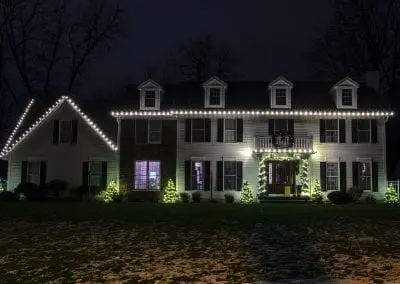 WYnantskill area home decorated for Christmas with white lights from The Christmas Guys by Elfperts Inc