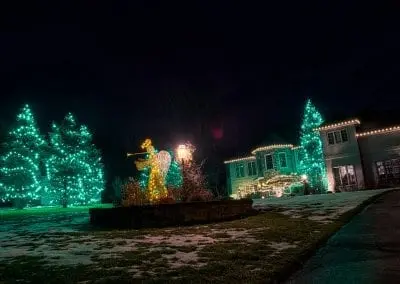 green and white led christma slights to decorate a house for the holidays