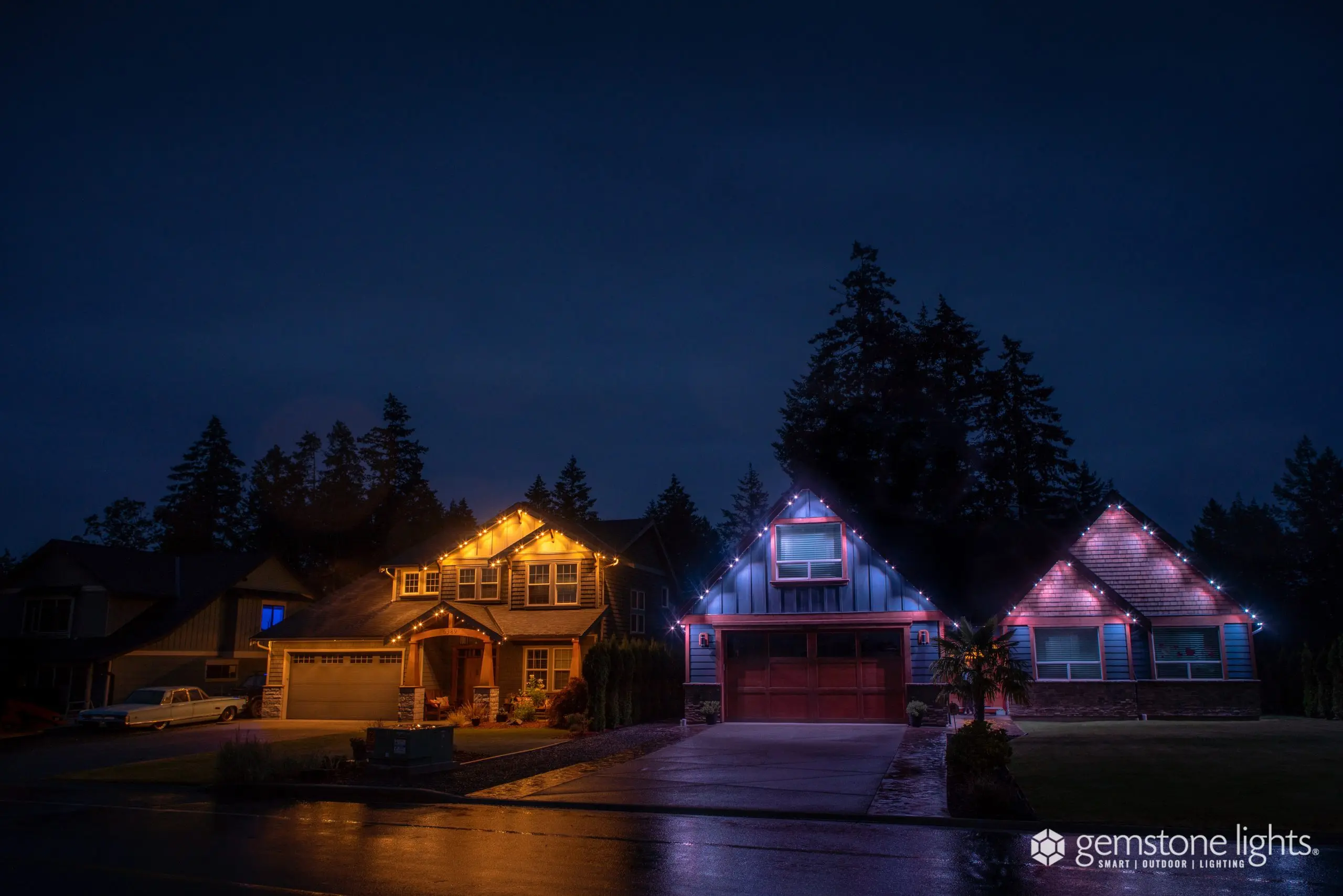 two homes with soffit lighting with different colors