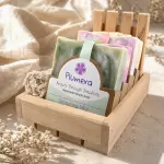 Plumera Fragrant Soap Box with four colorful handmade bars, wooden soap dish, sisal soap saver, and wood gift box