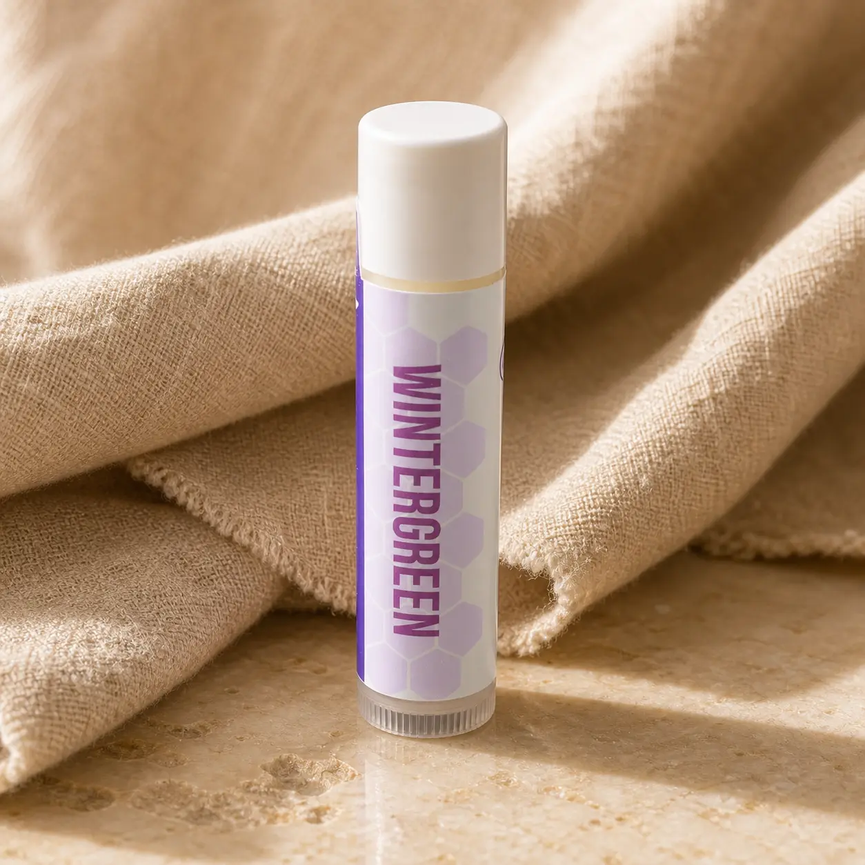 Single Wintergreen handmade lip balm tube by Plumera Essentials