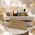 Nature Loving Gift Set in a light wood box with four handmade soaps, dropper oil, balm containers, wooden dish, and fiber accessories
