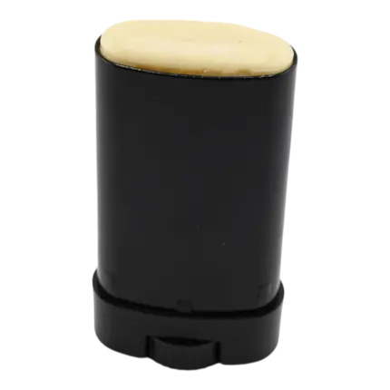 Open 0.5 ounce Thrive Botanical Balm stick showing the neutral balm texture