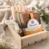 Plumera Fun Soap Box with four colorful handmade bars, a wooden soap dish, sisal soap saver, and wood gift box