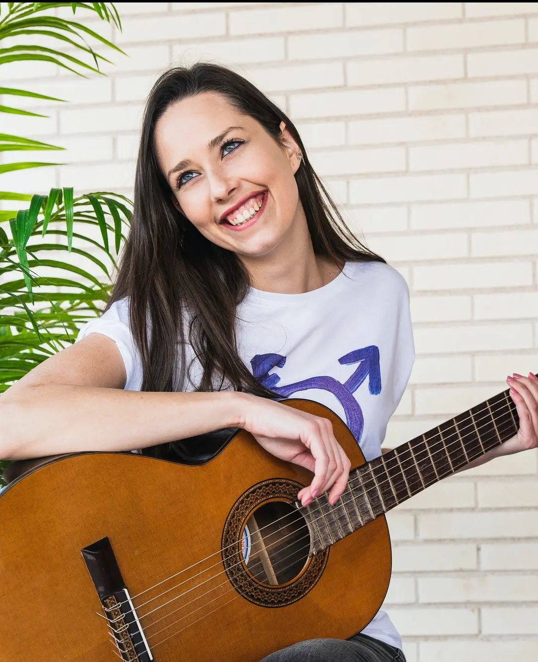Happy musicians with guitars laughing