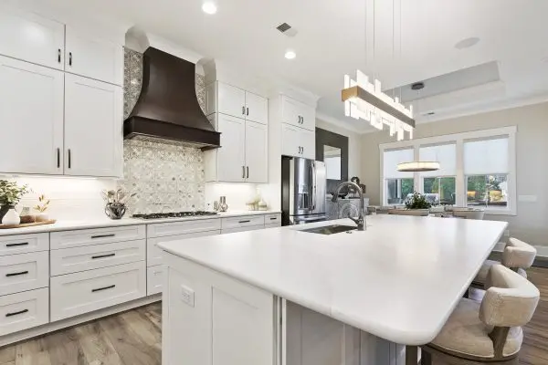 white kitchen with custom stacked cabinets in Margaritaville, SC new construction