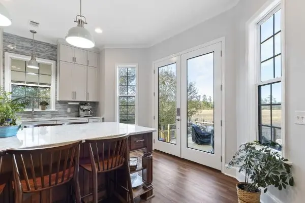 custom kitchen remodel with large island and cabinets