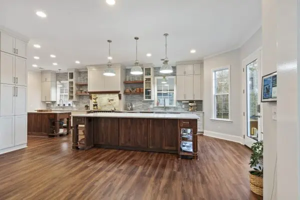 custom kitchen renovation with two islands and white cabinets