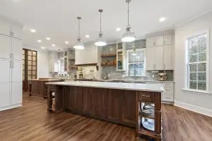 white custom kitchen remodel with two islands