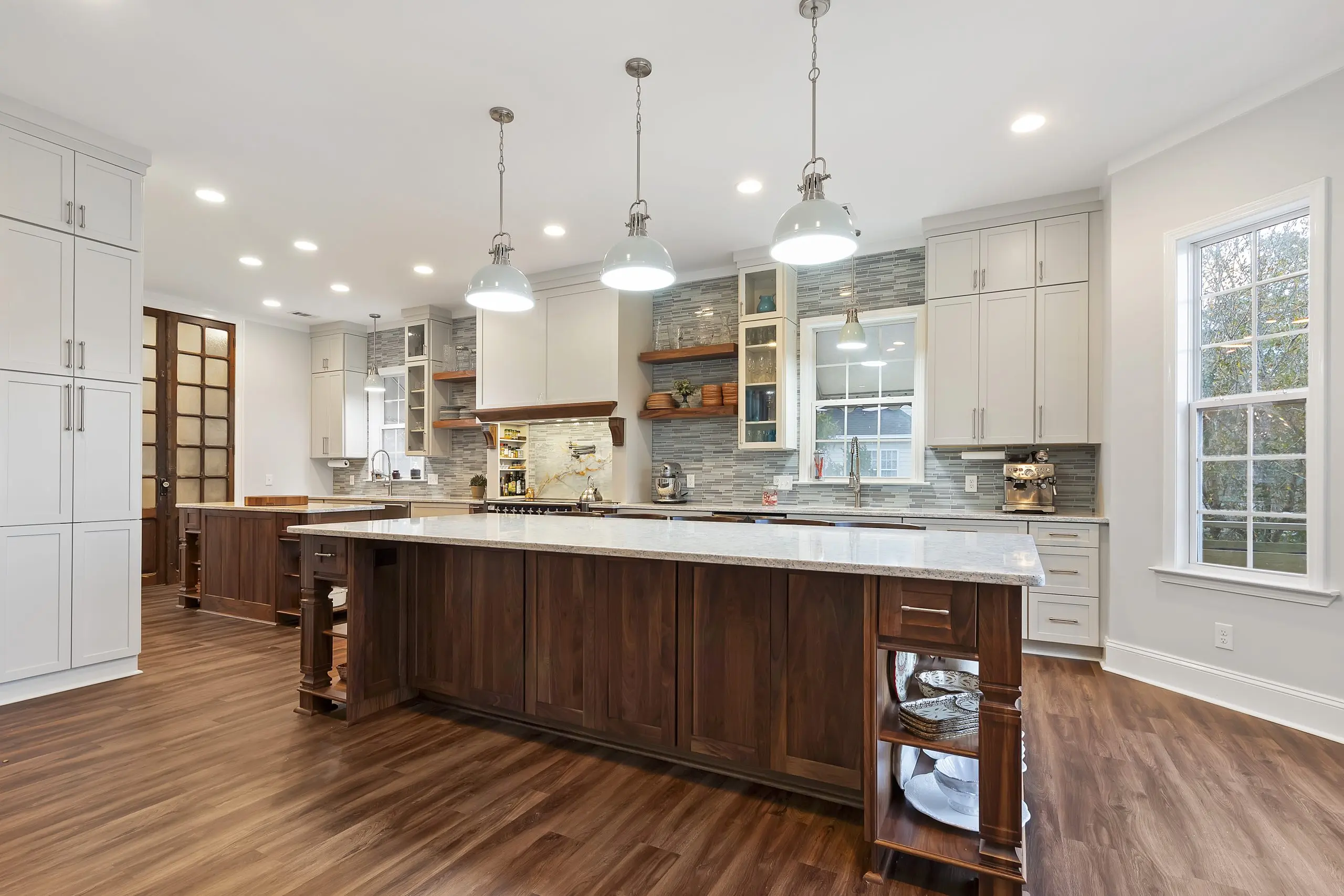 white custom kitchen remodel with two islands