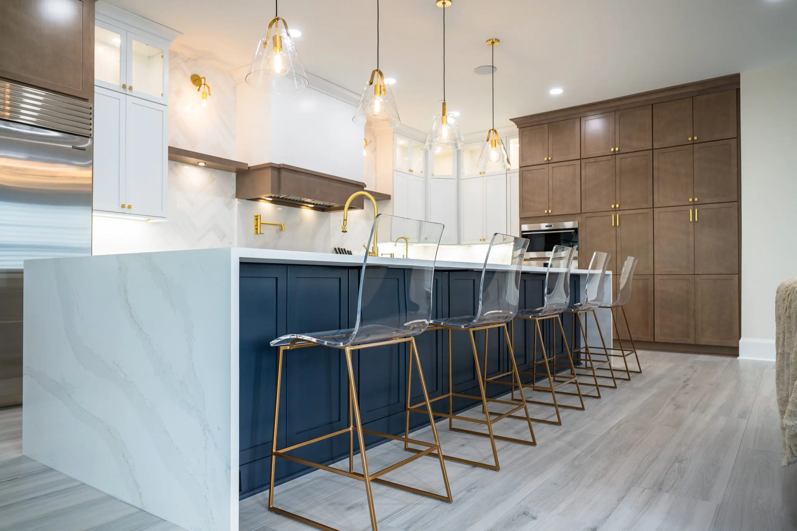 White Quarts Waterfall Edge on Oversized Kitchen Island