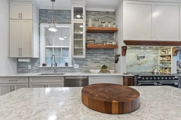White custom kitchen remodel with prep island
