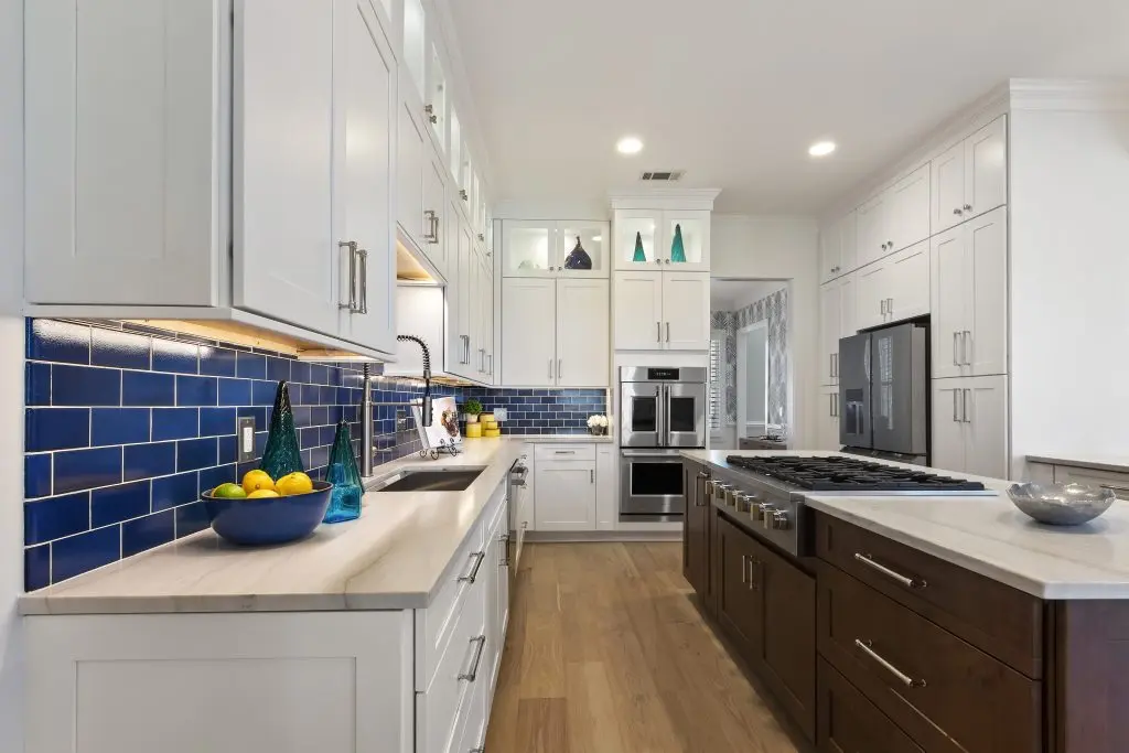Kitchen Remodel Case Study - Savannah blue and white kitchen remodel with brown kitchen island