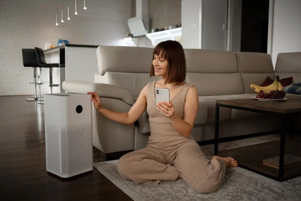Air purifiers in Opelika, AL, women using air purifier