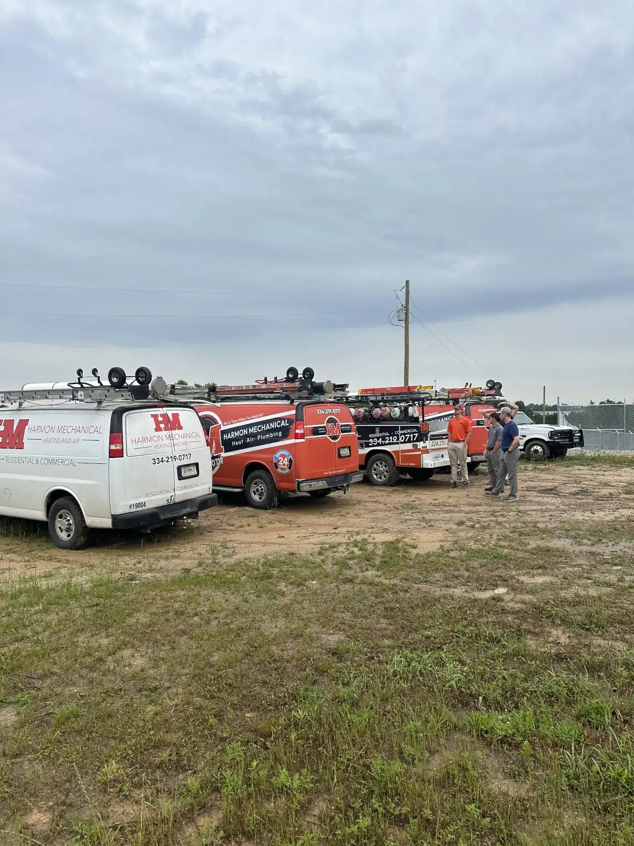 Harmon Mechanical company vehicles and team