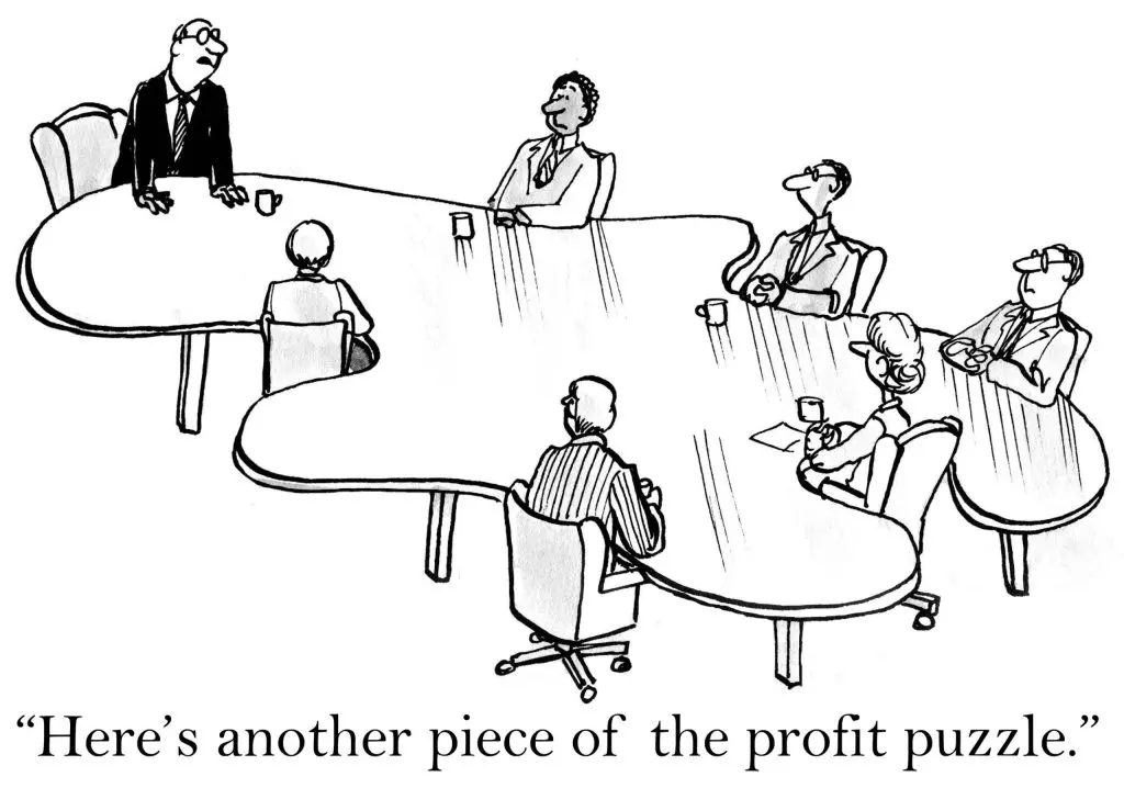 CFO and controller discussing financial strategy and profit puzzle in a business meeting.