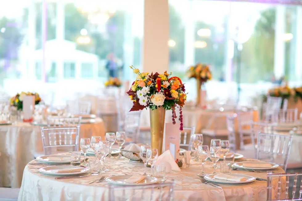 Elegant wedding reception tables before cleaning and venue waste management