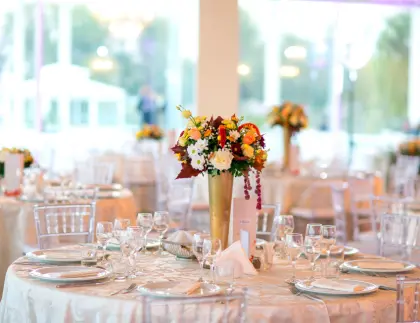 Elegant wedding reception tables before cleaning and venue waste management