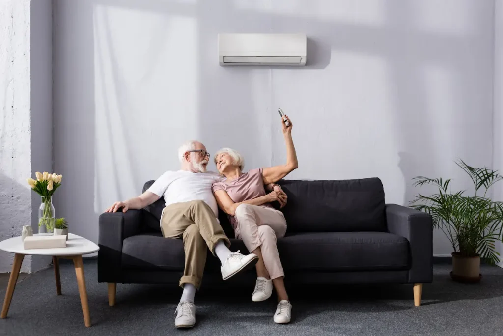 Couple enjoying cool house with air conditioning in Lincoln Park