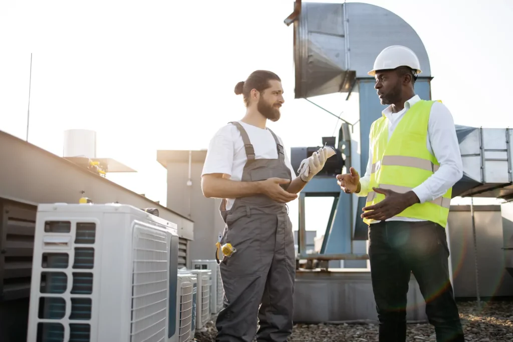 HVAC workers chatting