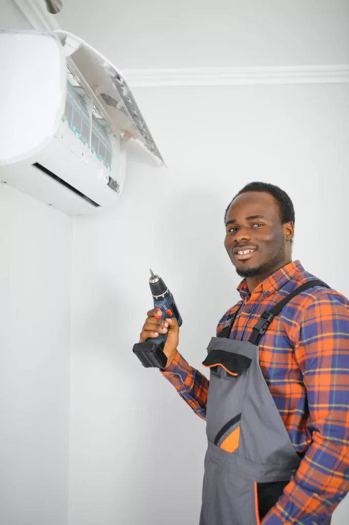 Hvac technician fixing mini split