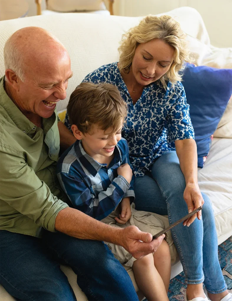 Family looking at tablet