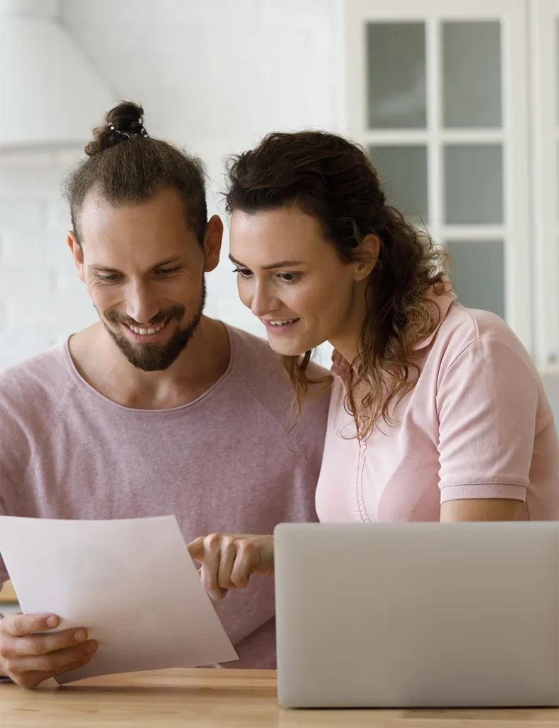 Couple looking at list of features and benefits