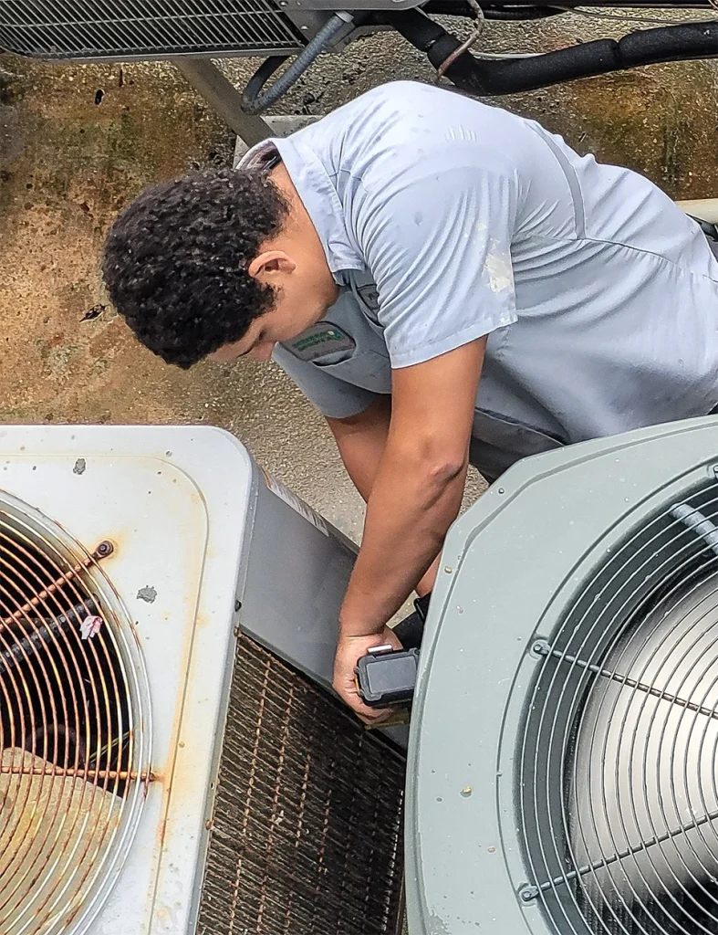 Hvac professional repairing Heat pump