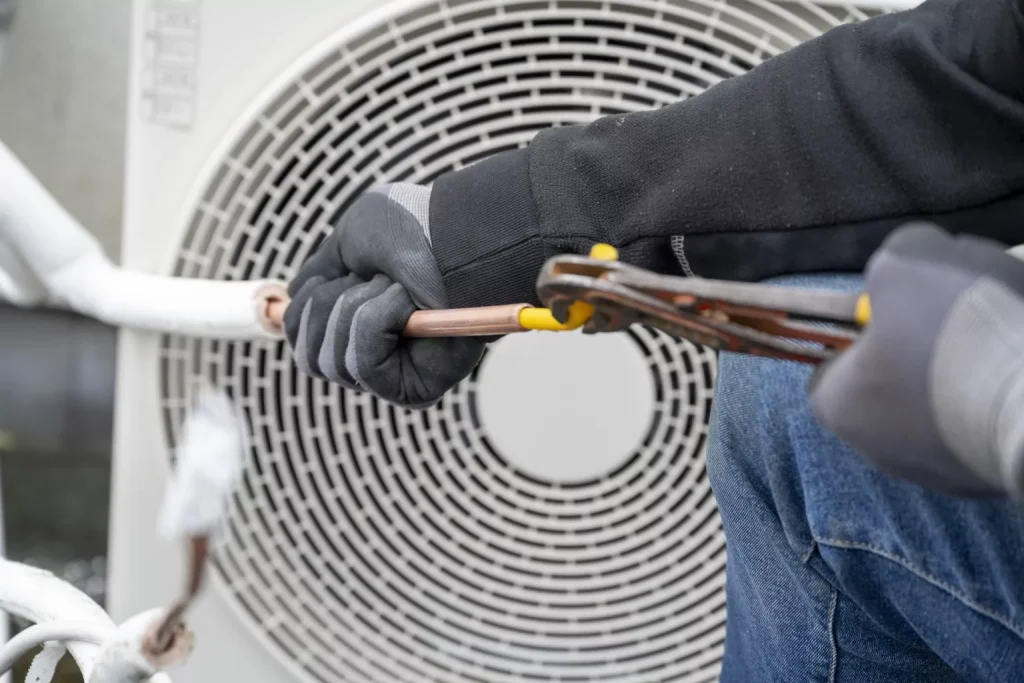 fixing outdoor unit pipes
