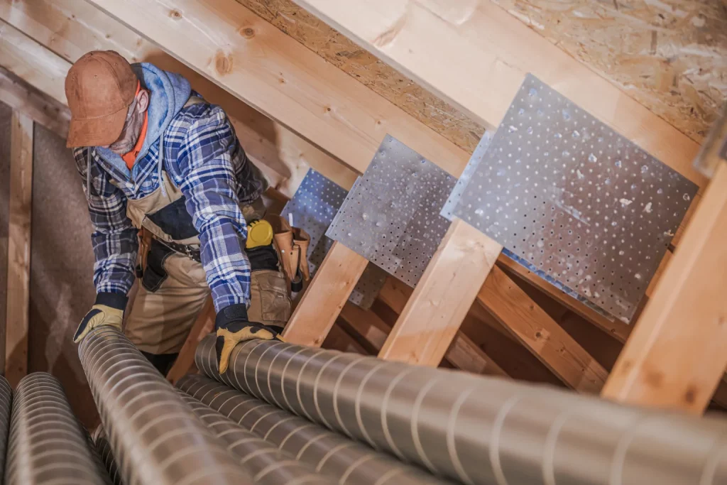 hvac technician installing ducts