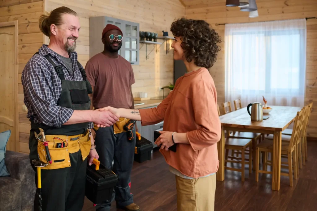 shaking hands with hvac workers
