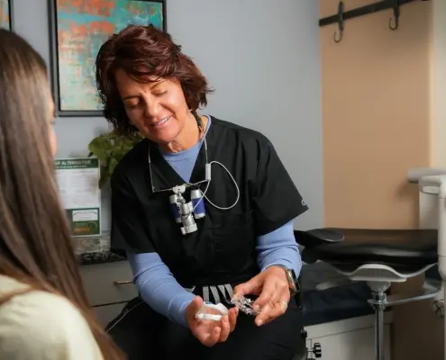 Dr. Snow showing patient alternatives to CPAP for sleep apnea