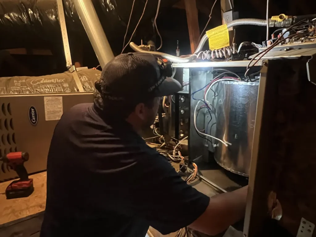 Salute AC technician operating equipment