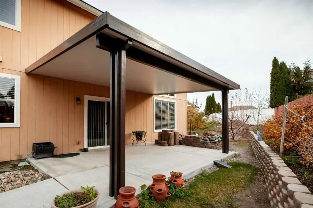 outdoor living space with custom patio cover by Patio Covers Unlimited NW
