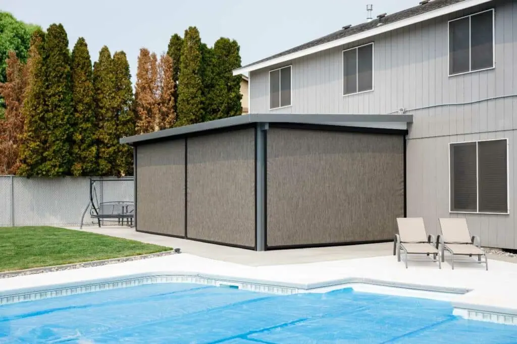 exterior screens beautifully installed by the pool area from Patio Covers Unlimited NW
