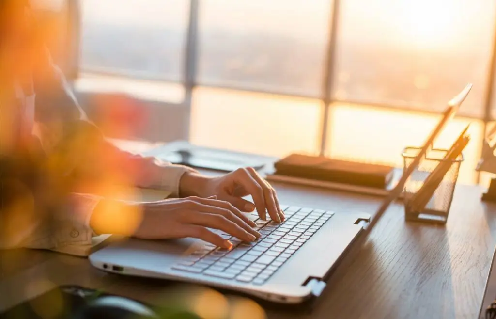 Author writing a new blog on her custom WordPress website