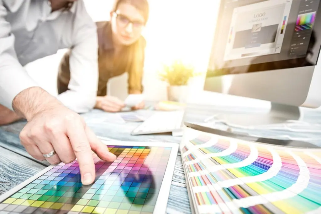 designers choosing colors for a bespoke web design