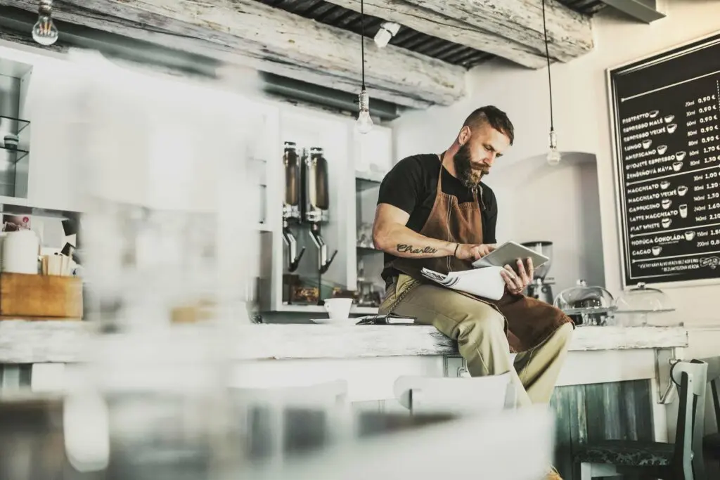 small business owner works on his website