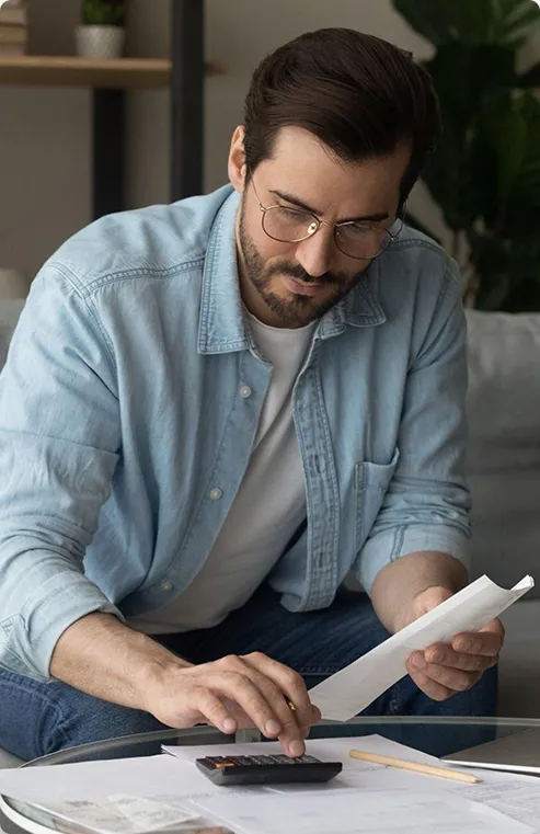 Man calculating ac repair costs