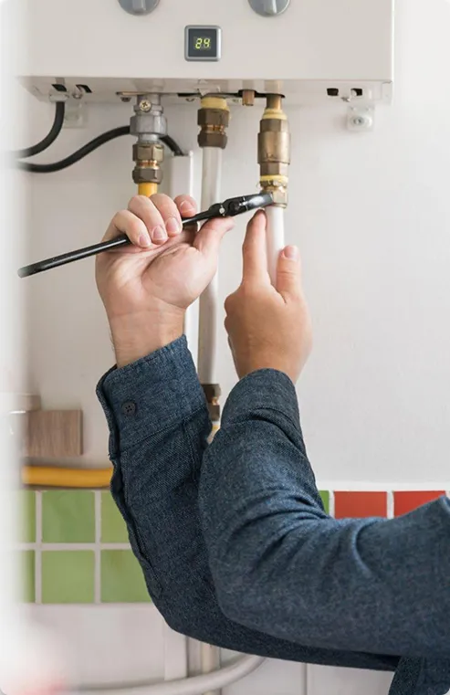 Man installing boiler